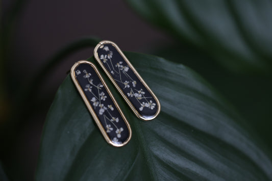 Gold Botanical Earrings on Black Background