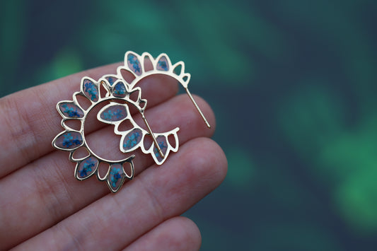Sun-Inspired Earrings with blue flowers