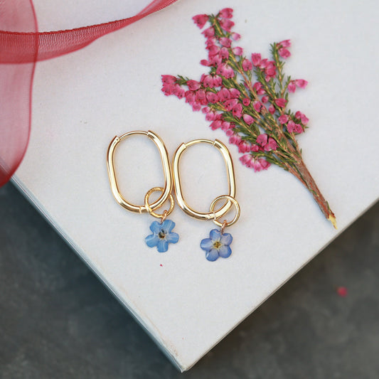 Pressed flower hoop earrings with removable forget me not charm
