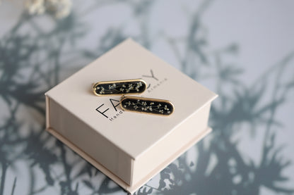 Gold Botanical Earrings on Black Background