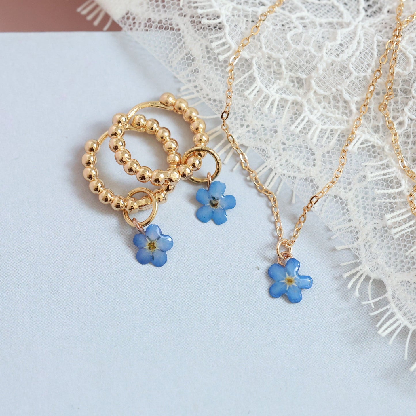 Two-Way Gold hoop earrings with real forget me not floral charm