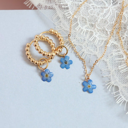 Two-Way Gold hoop earrings with real forget me not floral charm