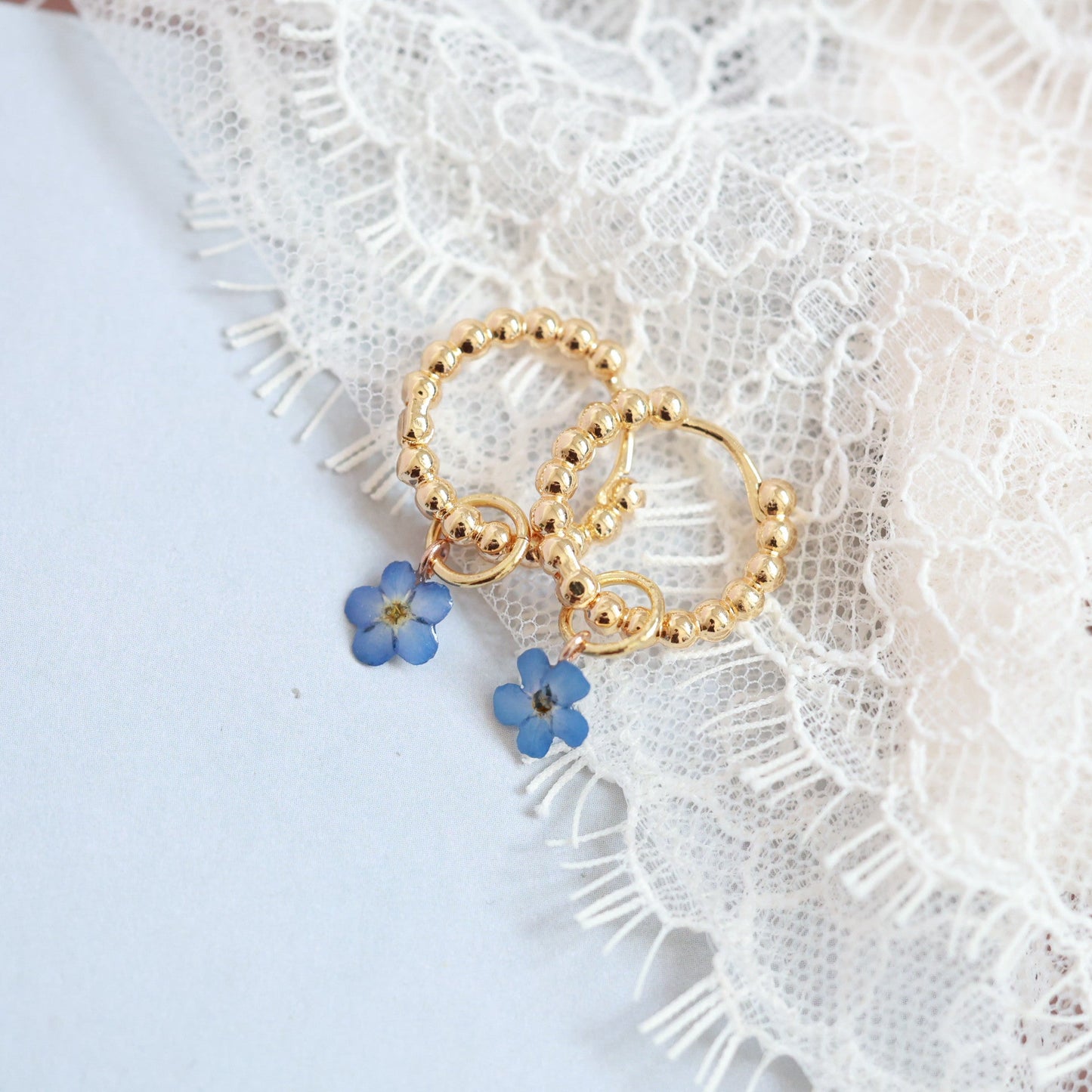 Two-Way Gold hoop earrings with real forget me not floral charm