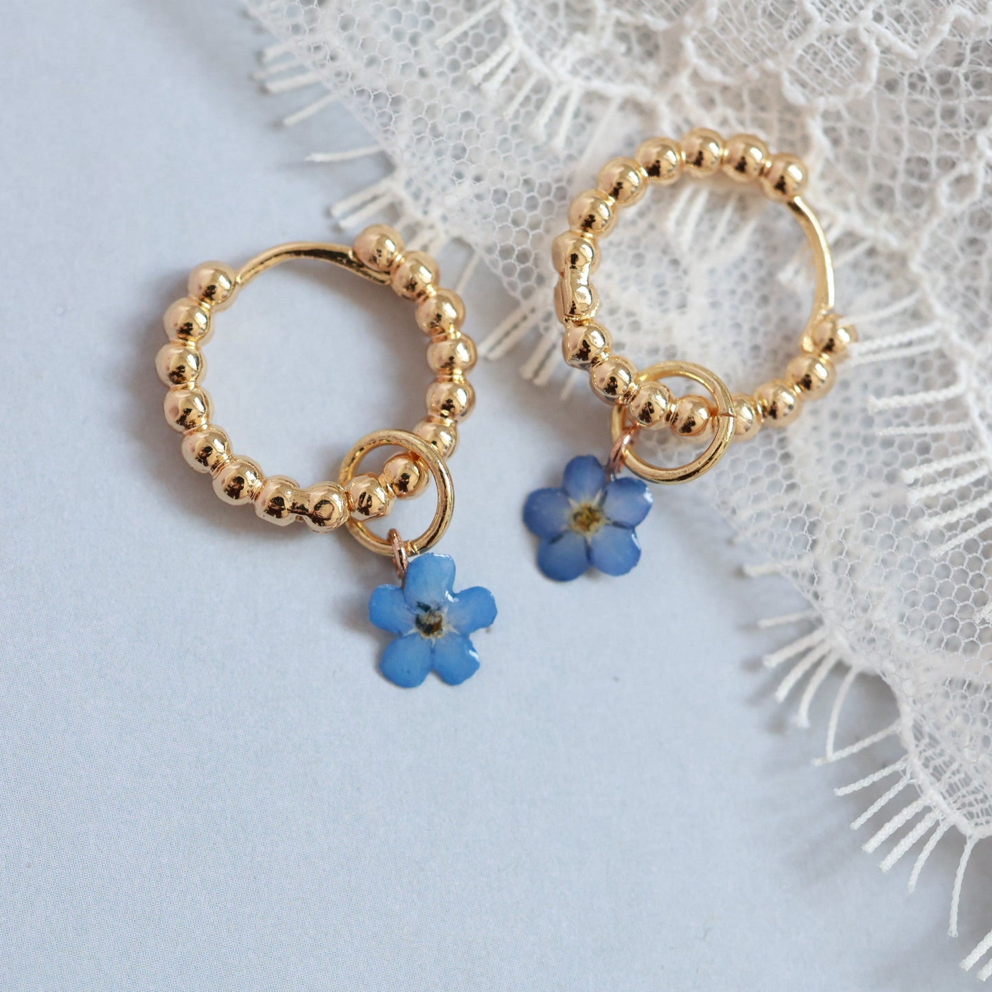 Two-Way Gold hoop earrings with real forget me not floral charm