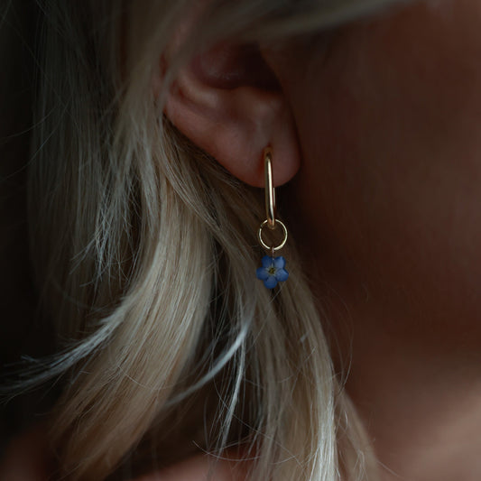 Pressed flower hoop earrings with removable forget me not charm